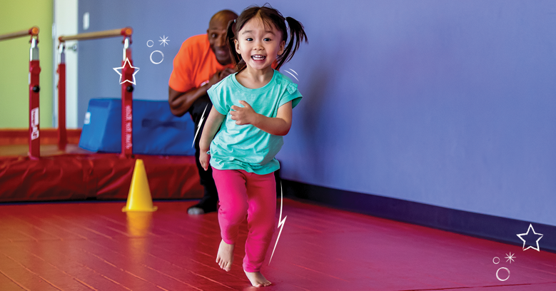 Little girl running towards camera in The Little Gym